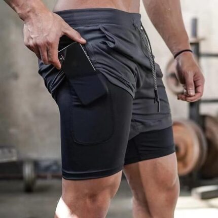 Short de sport 2-en-1 avec poche téléphone – Compression + Surshort